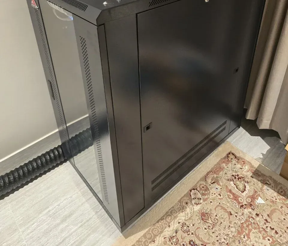 Black 22U AVAYO rack cabinet that holds the homelab